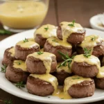 garlic butter steak bites with parmesan cream sauce served hot
