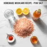 Homemade Mounjaro recipe pink salt ingredients showing pink Himalayan salt with lemon and other components