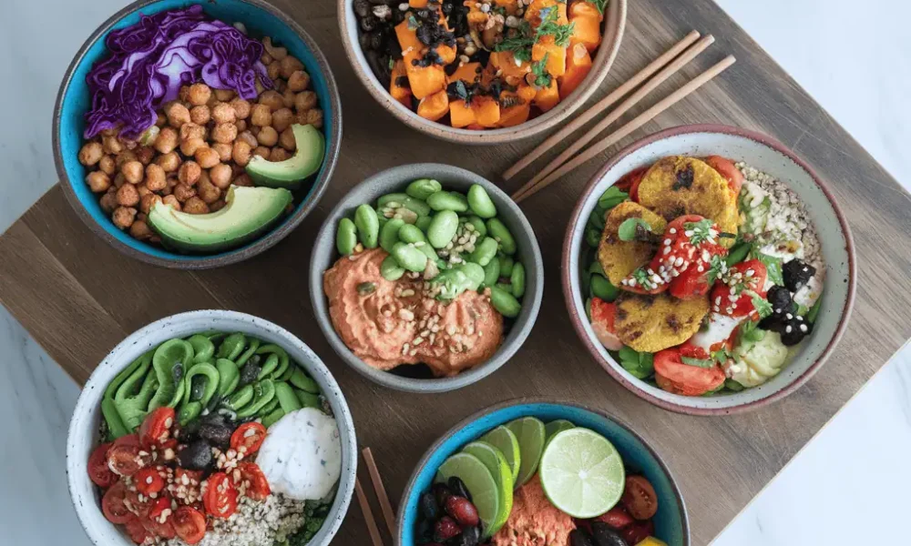 Colorful vegan power bowl recipes with quinoa, greens, and plant-based protein